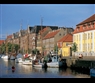 Christianshavns Canal with Fishing Vessels by Cees van Roeden - Visit Denmark